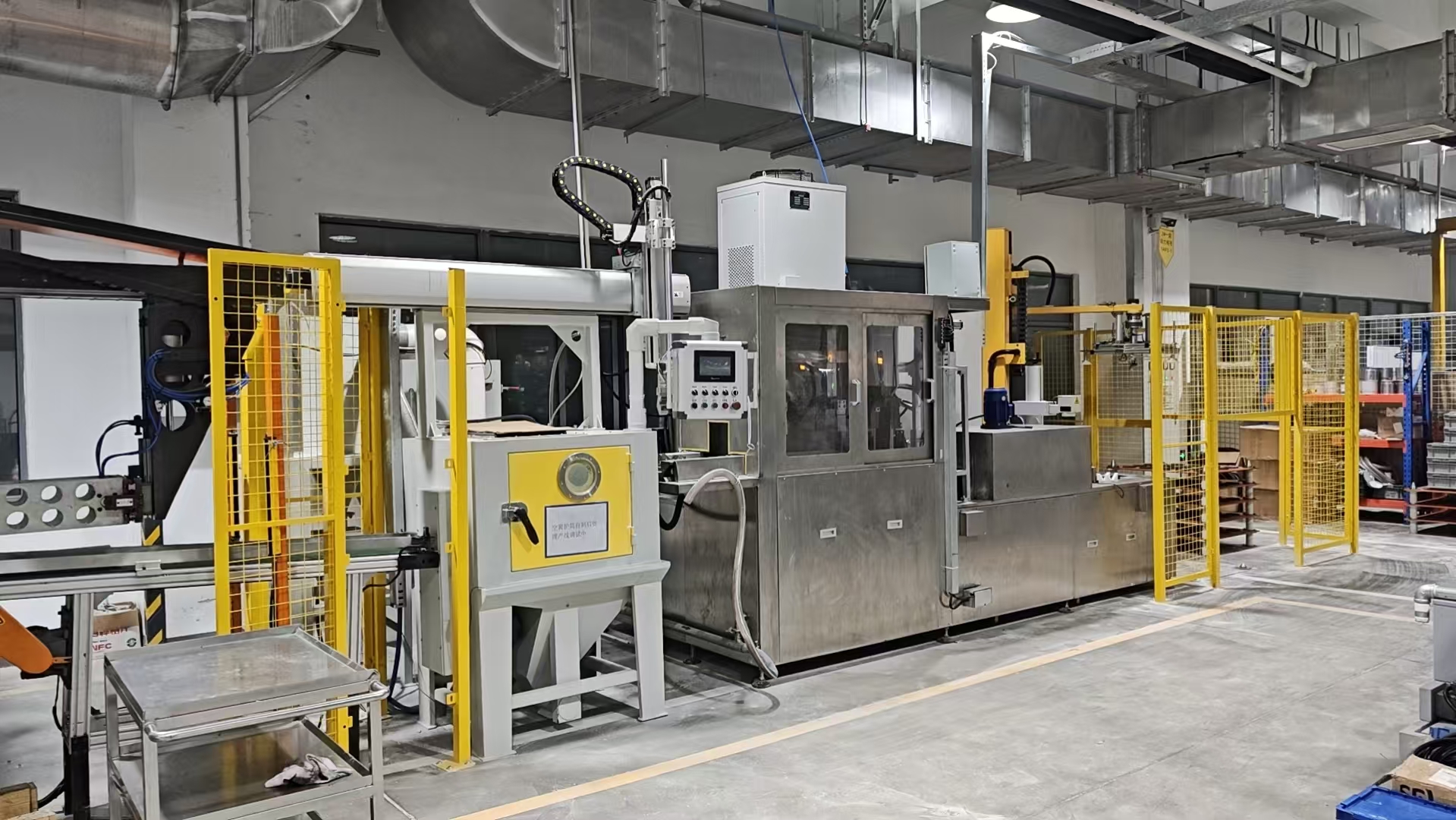 昆航智能自动喷砂机助力汽车空簧行业发展